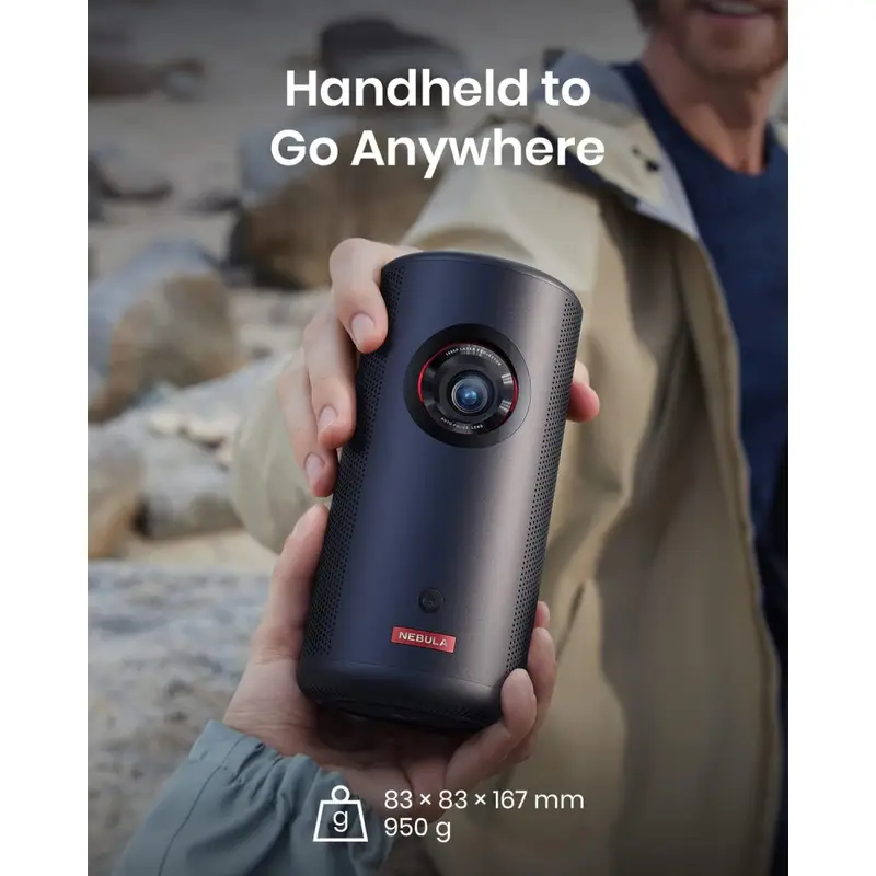 Hand holding the portable, cylindrical NEBULA Capsule 3 Laser projector, emphasizing its compact size for the full Best Temu Mini Projector Review.